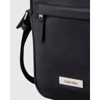 Calvin Klein - Sleek Reporter  